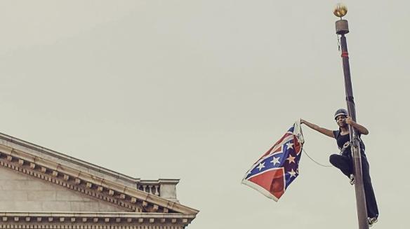 Bree-Newsome-takes-down-the-Confederate-Flag-from-a-pole-at-the-Statehouse-in-Co